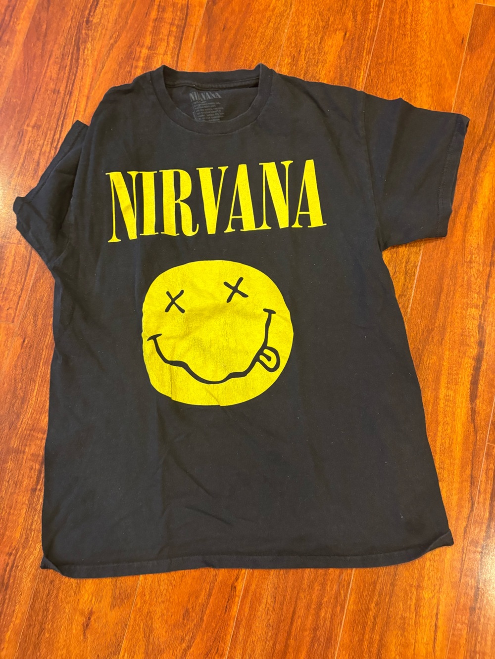 NIRVANA Black Tee with Yellow Smiley Logo